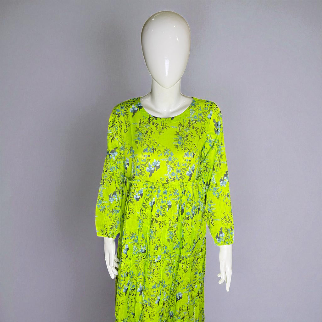 Mannequin wearing a bright green floral dress against a gray background