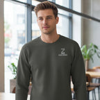 Man wearing a dark gray sweatshirt with a logo in an indoor setting